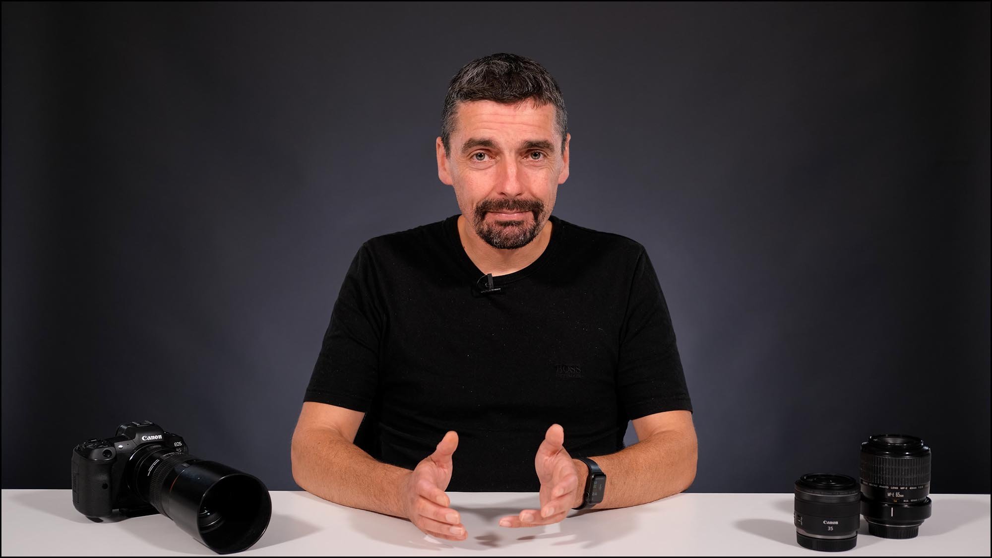 Oliver Wright in Studio with cameras and lenses