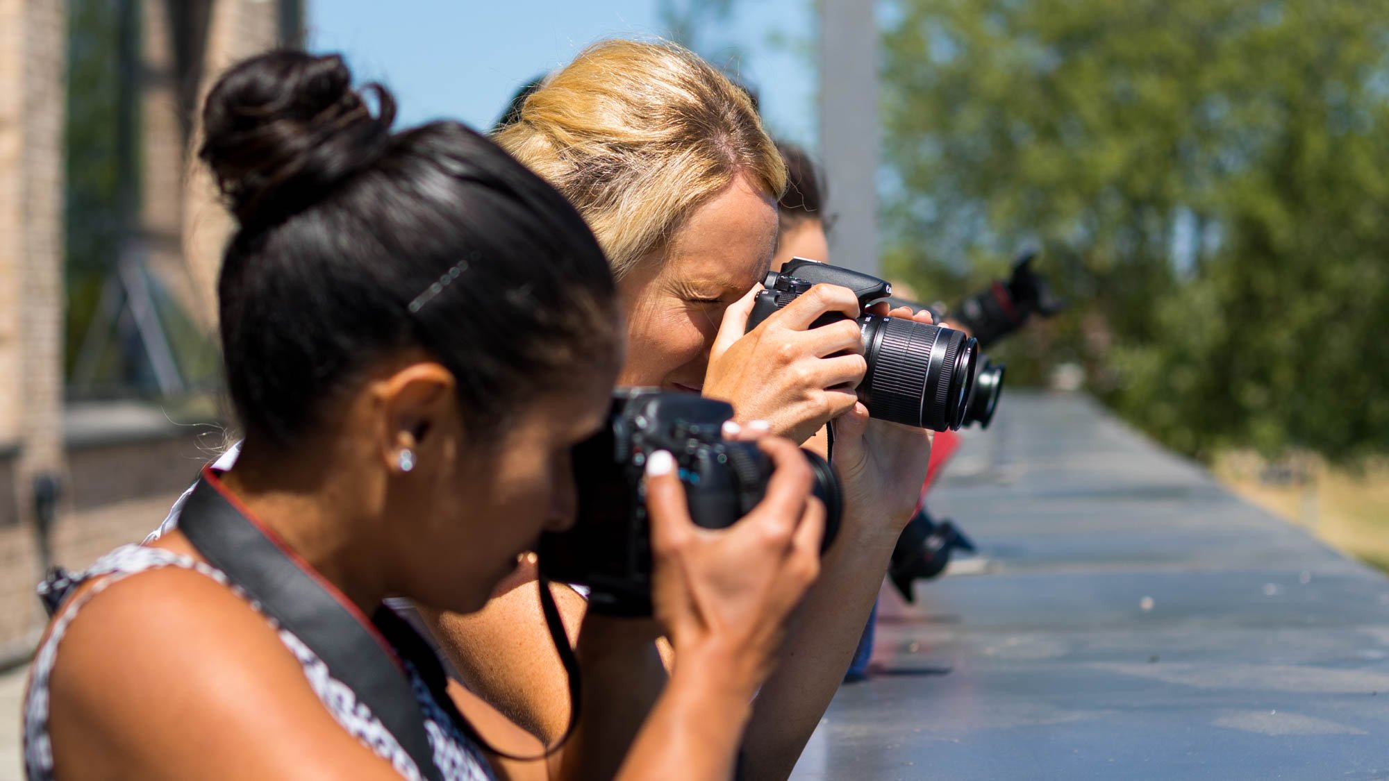 Learning photographers taking pictures
