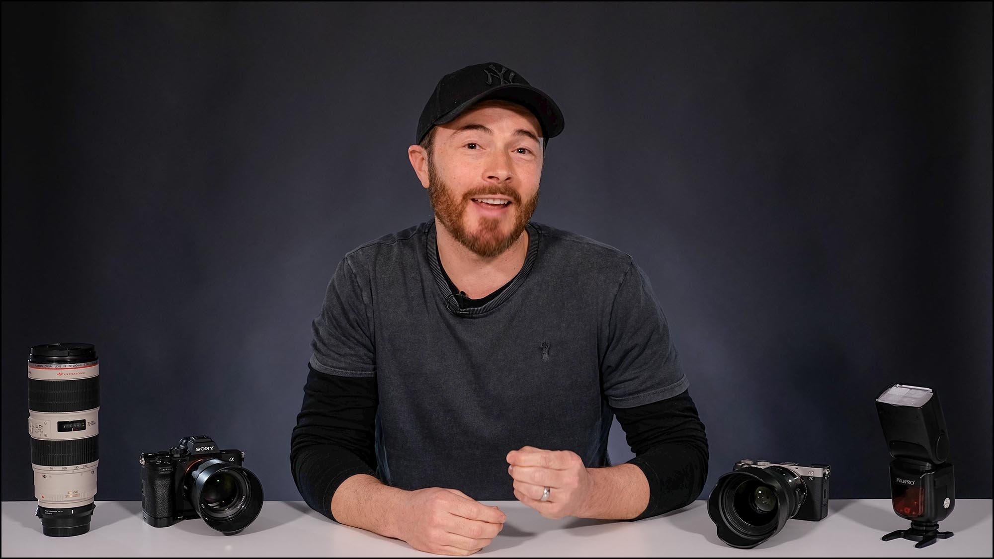 Mark McGee at desk presenting
