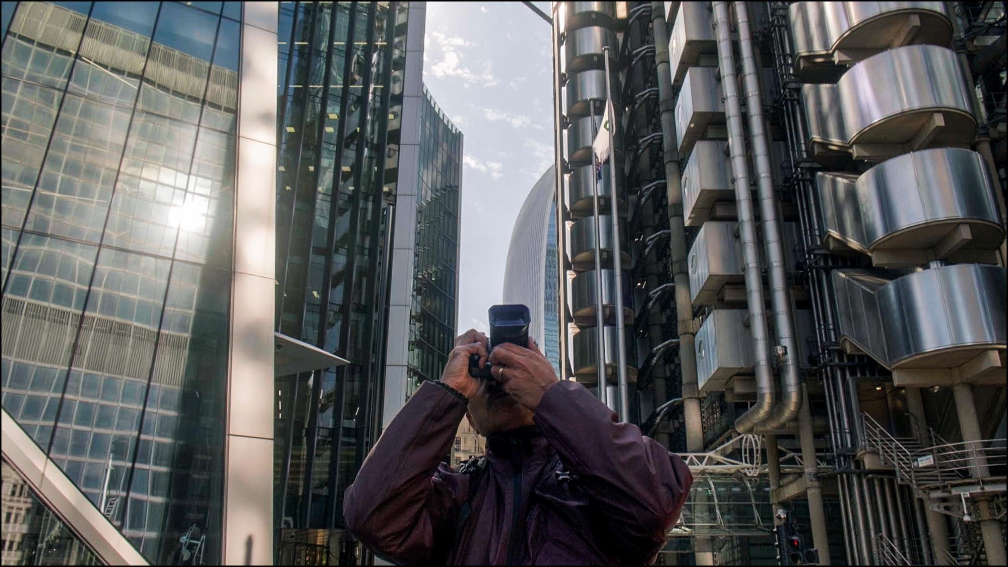Bal taking picture in business district