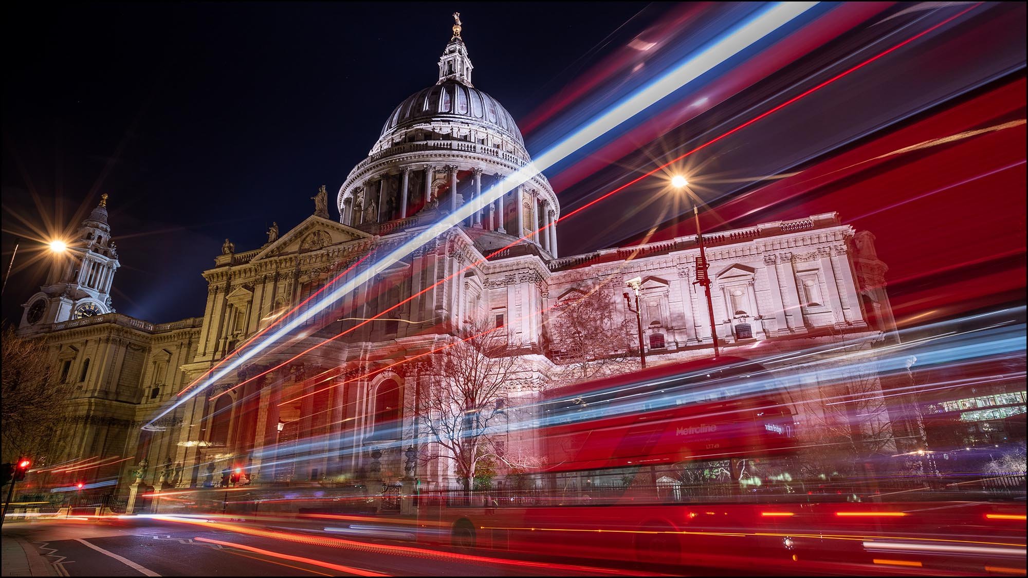 Bus streaking image at night in front of St Paul's in London